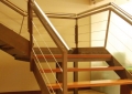Escalera de hierro con barandilla de acero inoxidable en notaria de Coso 41(Zaragoza)